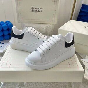 ALEXANDER MCQUEEN Elgard oversized leather lace-up white sneakers